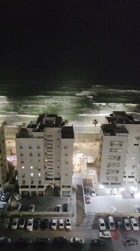 Nighttime coastal view captured in Bat Yam, Israel