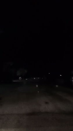 Purple light flash captured on dark road in Bulgaria