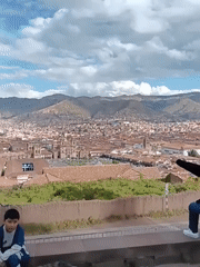 Evening views captured of historic Cuzco cityscape and bell tower