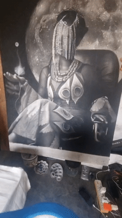 Artist creates portraits at outdoor studio in Onitsha