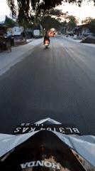 Motorcycle journey recorded on Lhokseumawe road during twilight hours