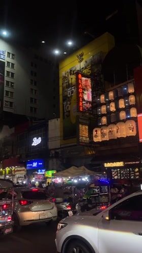 Bangkok's Chinatown at night, streets and snacks included
