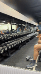 Gym-goer takes mirror selfie in Choeng Mon Thailand