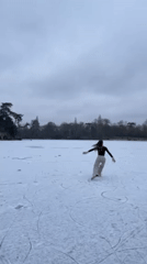Parisians venture onto frozen park lakes during winter day