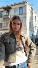 Woman photographed at multiple Tbilisi locations during brief timespan