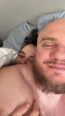 Couple shares intimate selfie moment in Morton Grove bedroom