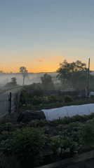 Dawn sunrise captured over rural Russian landscape in Уральское