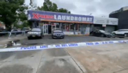 Police cordon off area outside New York laundromat