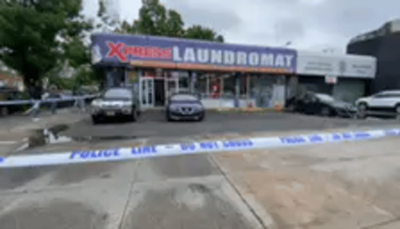 Police cordon off area outside New York laundromat