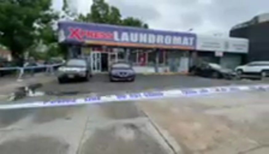 Police cordon off area outside New York laundromat