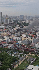 Thick smoke rises from a Makati building fire