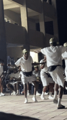 White-uniformed groups perform dances, marching band practice in Maiduguri