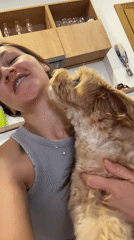 Woman shares affectionate moment with small dog in Montenegro