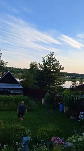 Backyard games on a summer afternoon in rural Russia