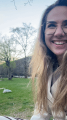 Woman poses, duck swims in Blagoevgrad park Sunday afternoon