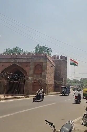 Delhi morning scenes: historic gate and urban architecture documented