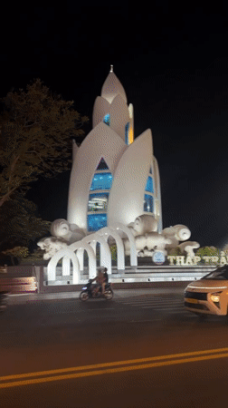 Illuminated monument filmed at night in Nha Trang, Vietnam