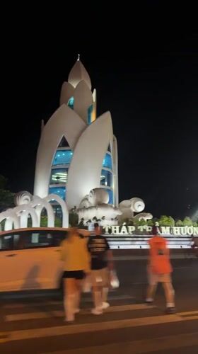 Illuminated monument filmed at night in Nha Trang, Vietnam