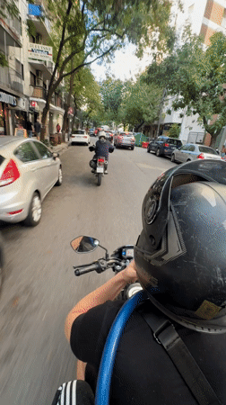Motorcyclist rides through Buenos Aires streets
