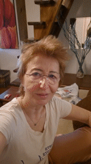 Woman takes selfies with peace signs in Plovdiv home