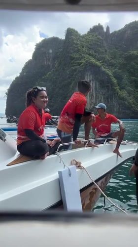Boat tour weaving past limestone islands off Ao Nang