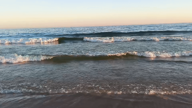 Sunset at a Portuguese beach, golden light over the Atlantic