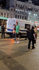 Uniformed officers detain person outside Saint Petersburg shopping mall