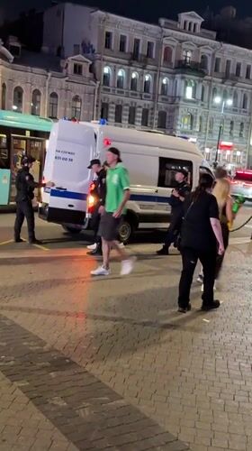 Uniformed officers detain person outside Saint Petersburg shopping mall