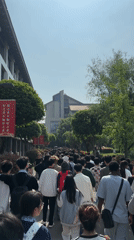 Large crowd walks university campus in Jiangjin at night