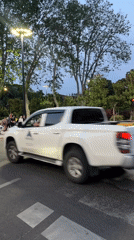 Regular traffic and pedestrians observed at Tbilisi intersection