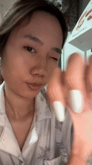 Person documents new nail polish in morning selfie session
