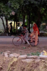 Gurgaon streets at dusk, mid-construction and in motion