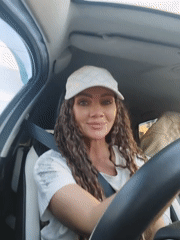 Behind the wheel in a white cap, multiple in-car shots