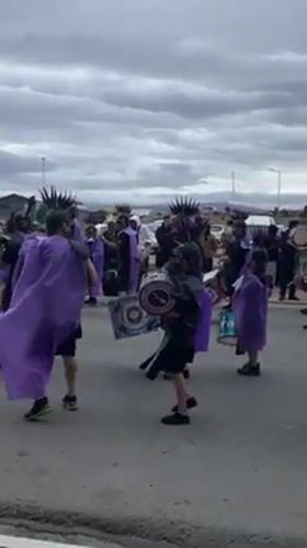 Costumed parade with drummers marches through Ushuaia, Argentina