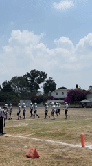 Football practice and children's play observed at outdoor venue