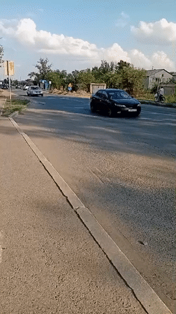 Everyday street activity in Semey, Kazakhstan, mid-morning