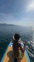 Quiet paddleboard moment on the water in Nha Trang