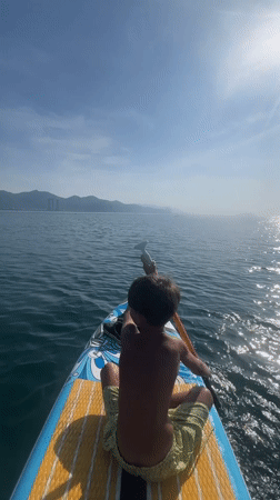 Quiet paddleboard moment on the water in Nha Trang