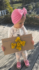 Child creates memory sign, plays with puppies in Wisła