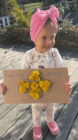 Child creates memory sign, plays with puppies in Wisła