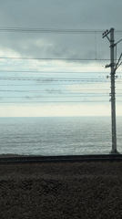 Train passenger captures scenic Black Sea coastal journey near Sochi