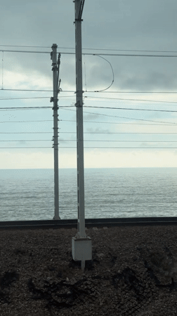 Train passenger captures scenic Black Sea coastal journey near Sochi