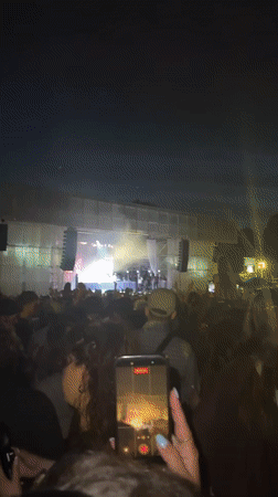 Male artist performs outdoor concert in London