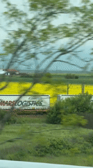 Vehicle passenger records Bulgarian countryside scenery near Zavoy