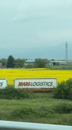 Vehicle passenger records Bulgarian countryside scenery near Zavoy