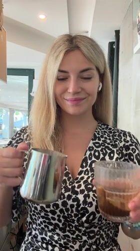 Espresso prep and a concert flyer in Budva, Montenegro