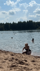 Summer lake day with swimming and paddleboarding in Novyi