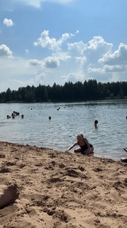 Summer lake day with swimming and paddleboarding in Novyi