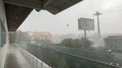 Heavy rainstorm floods Mexico City walkways, reduces visibility