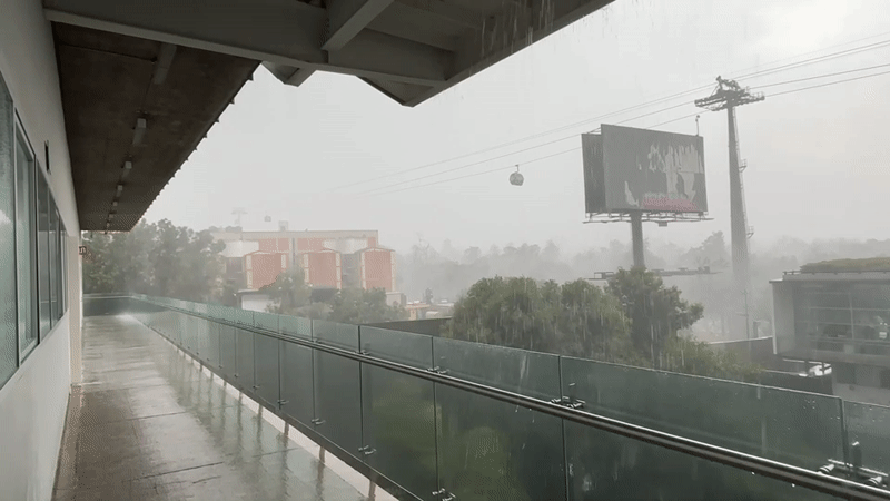 Heavy rainstorm floods Mexico City walkways, reduces visibility
